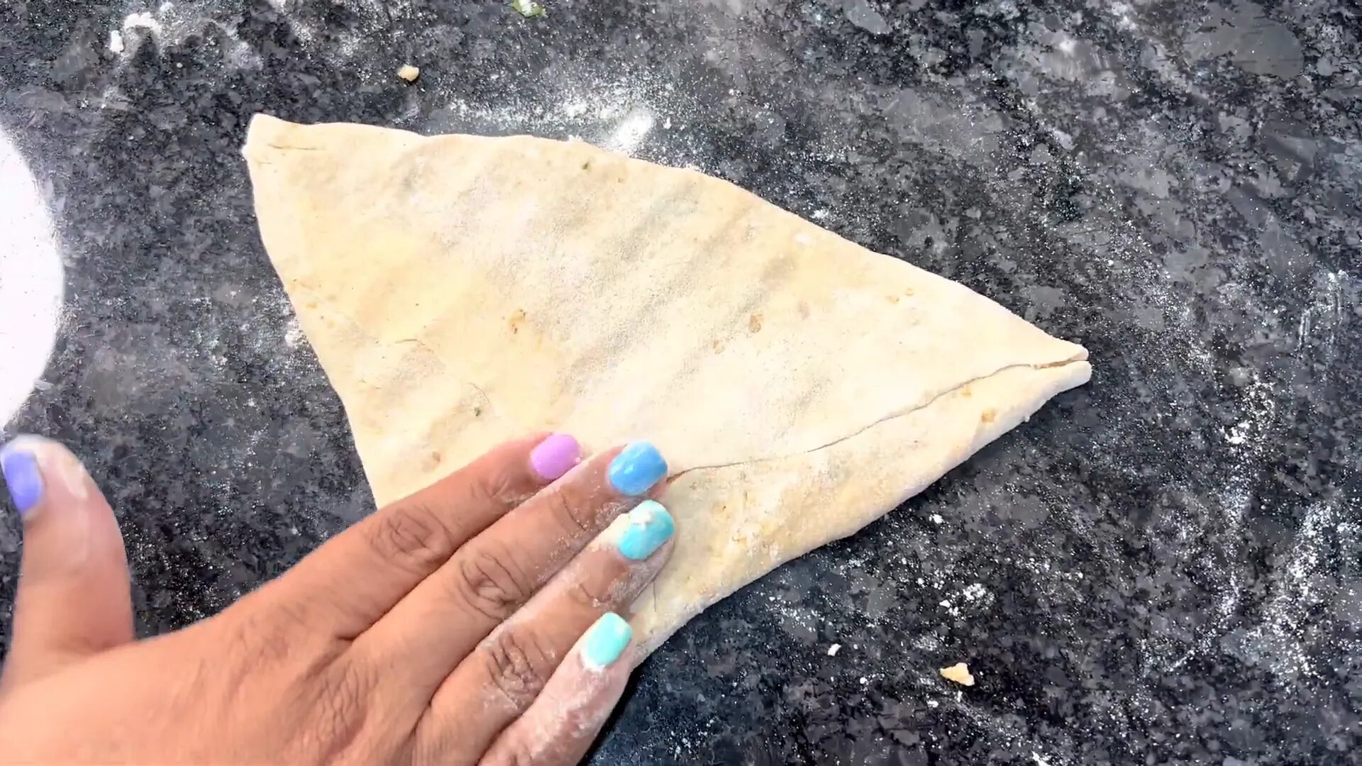 Stuffing the paratha with cauliflower filling